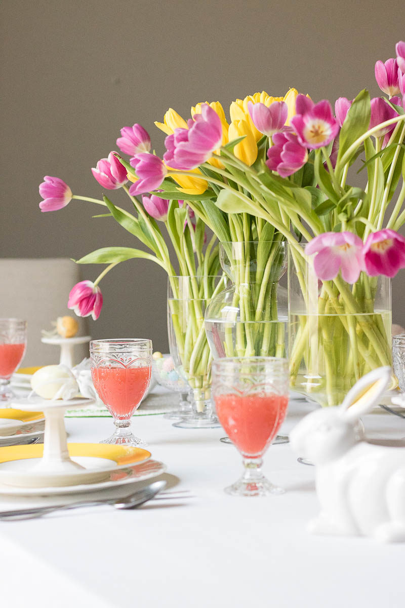 Set a Spring Table with pink and yellow tulips as your centerpiece.